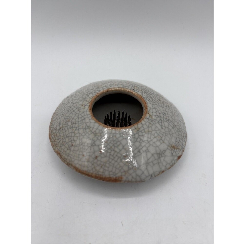 rounded ceramic Ikebana flower vase with a crackle-glaze finish